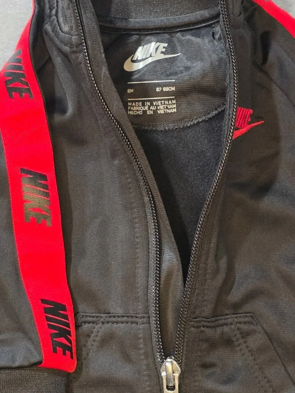 Nike Infant Jumpsuit 6M Black with Red Nike Logo Tape
